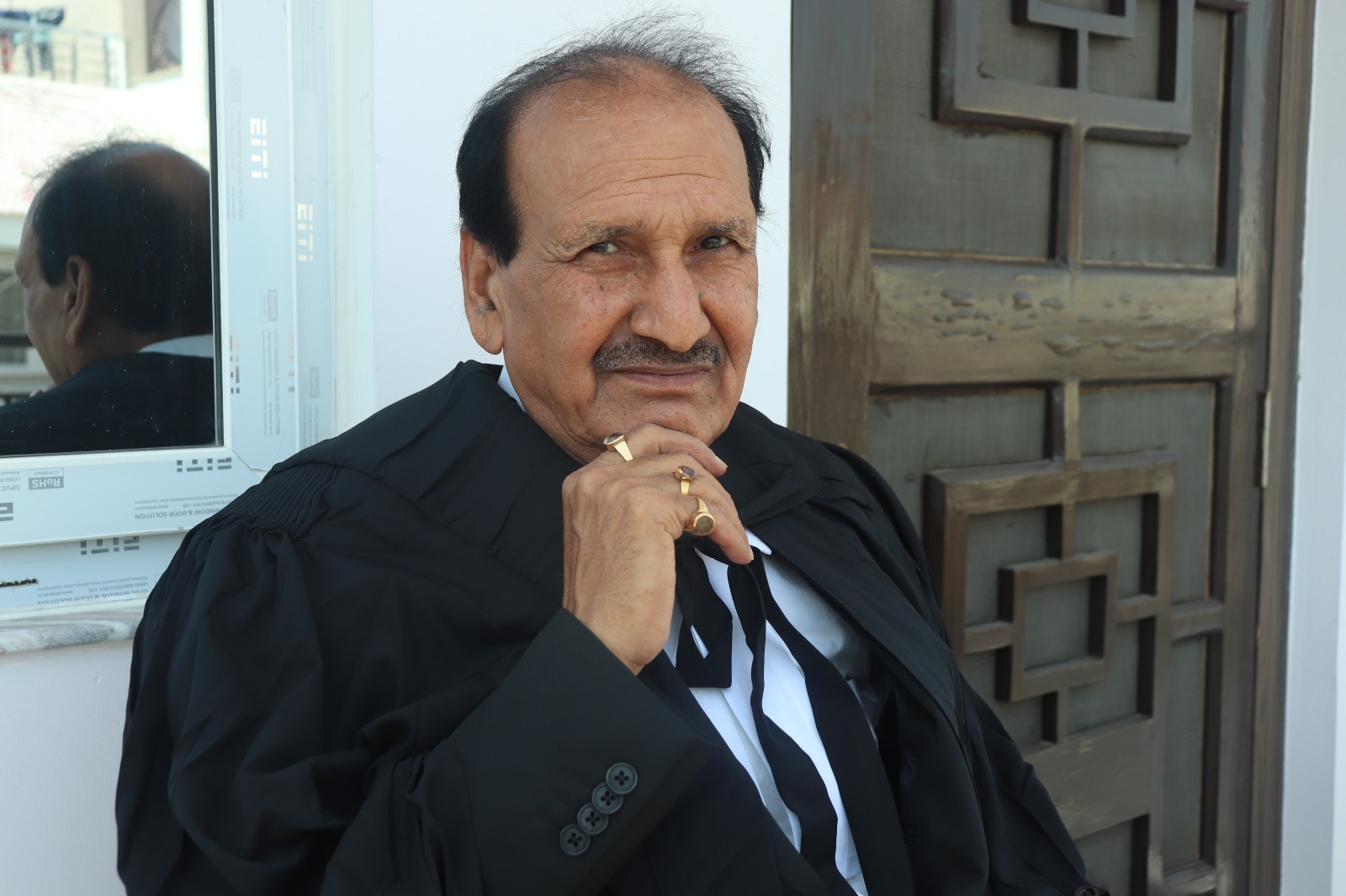 Advocate Choubey in court robes in library